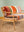 Wooden Sofa with Striped Velvet Cushions