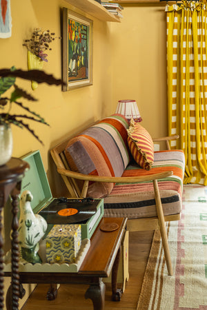 Wooden Sofa with Striped Velvet Cushions