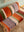 Wooden Sofa with Striped Velvet Cushions